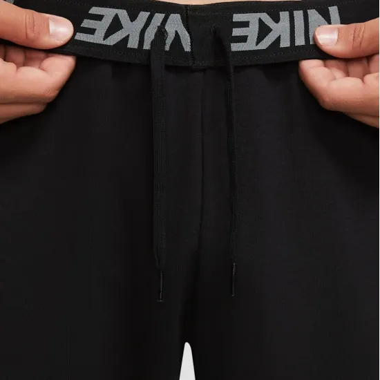 Спортивні штани Nike Dri-FIT Tapered Fashion Swoosh Pant CU6775-010