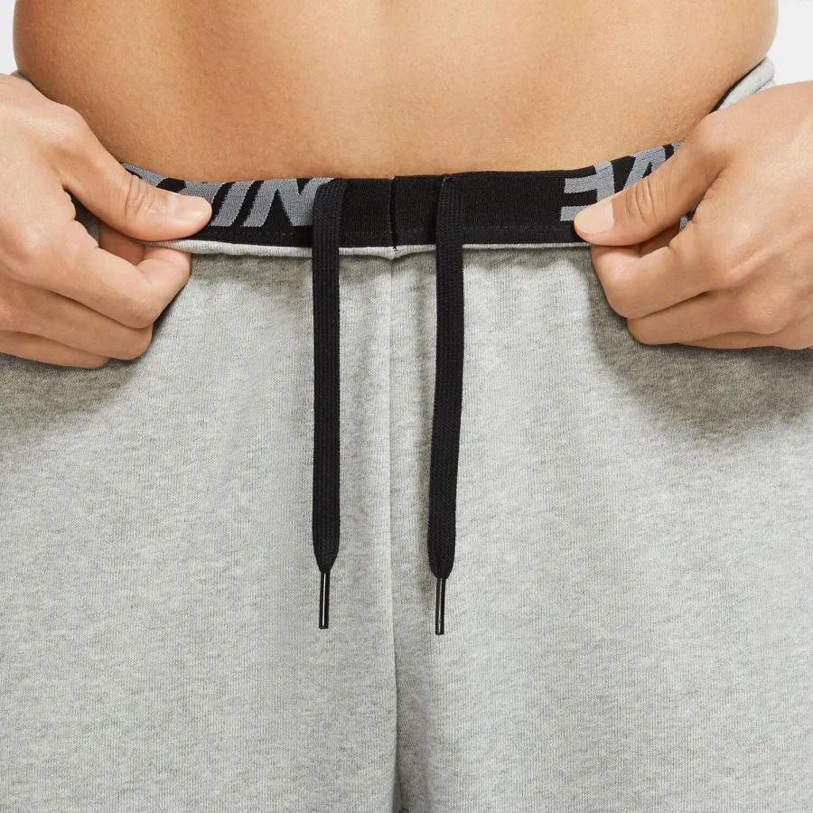 Спортивні штани Nike Dri-FIT Tapered Fashion Swoosh Pant CU6775-063