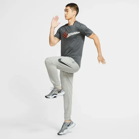 Спортивні штани Nike Dri-FIT Tapered Fashion Swoosh Pant CU6775-063