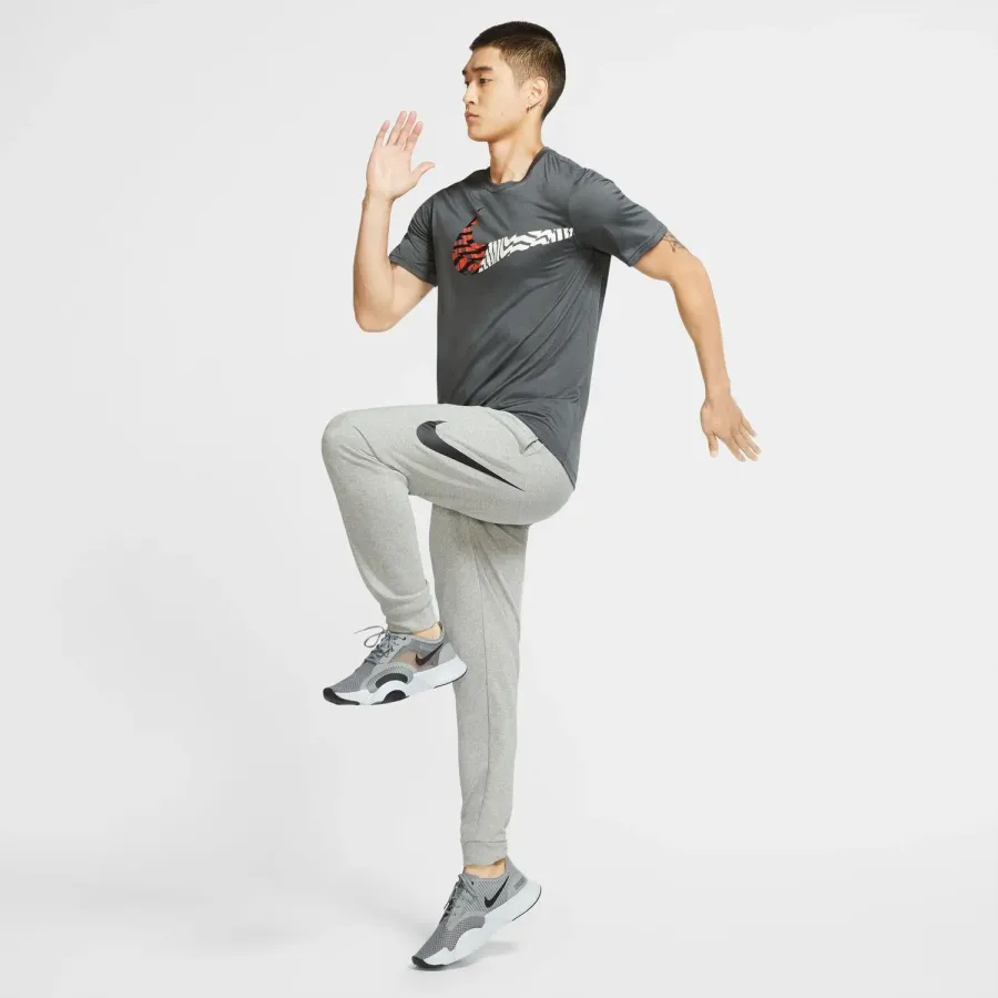 Спортивні штани Nike Dri-FIT Tapered Fashion Swoosh Pant CU6775-063