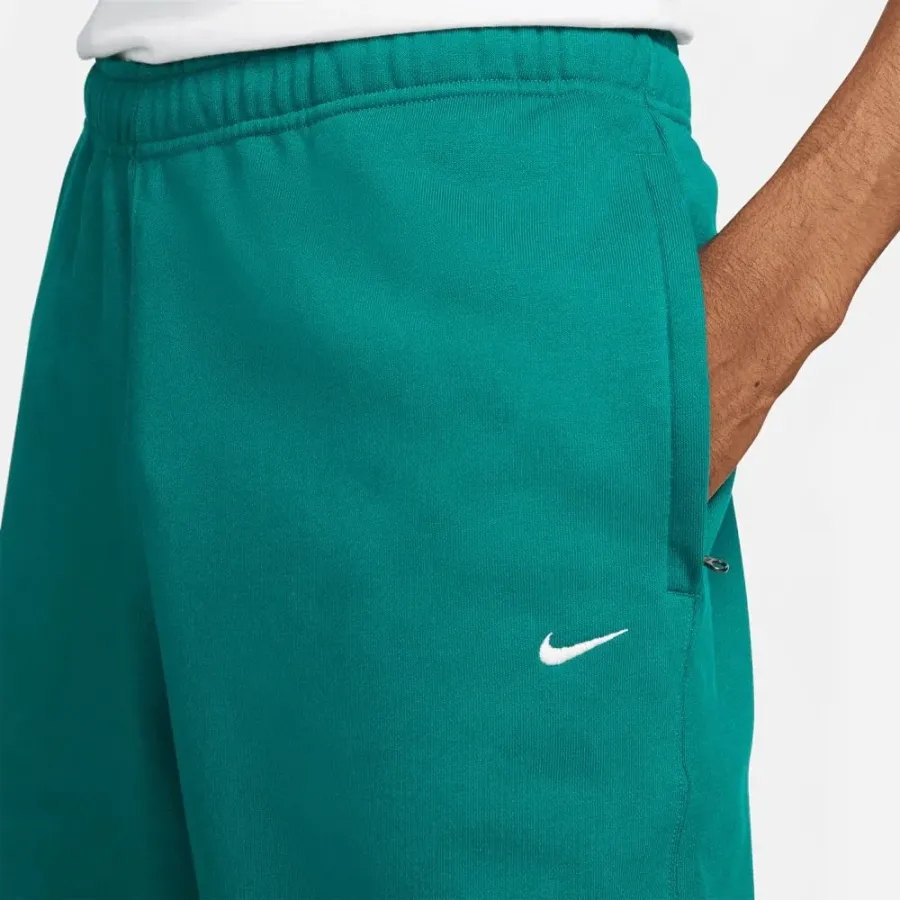 Штани Nike Solo Swoosh CW5460-340