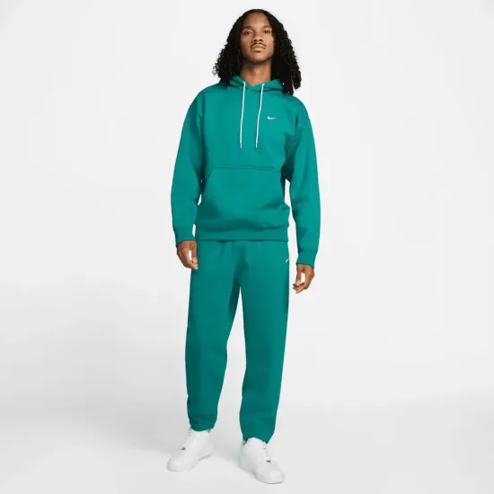 Штани Nike Solo Swoosh CW5460-340