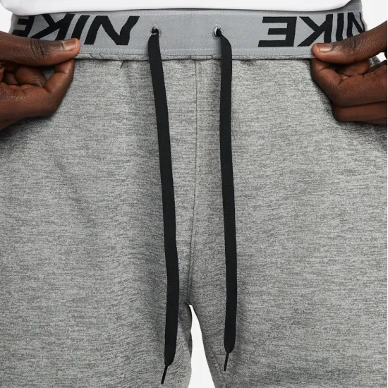 Штани Nike Therma-FIT Open Hem Fitness DQ4856-063
