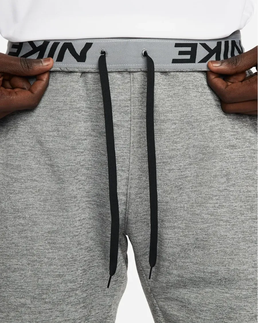 Штани Nike Therma-FIT Open Hem Fitness DQ4856-063