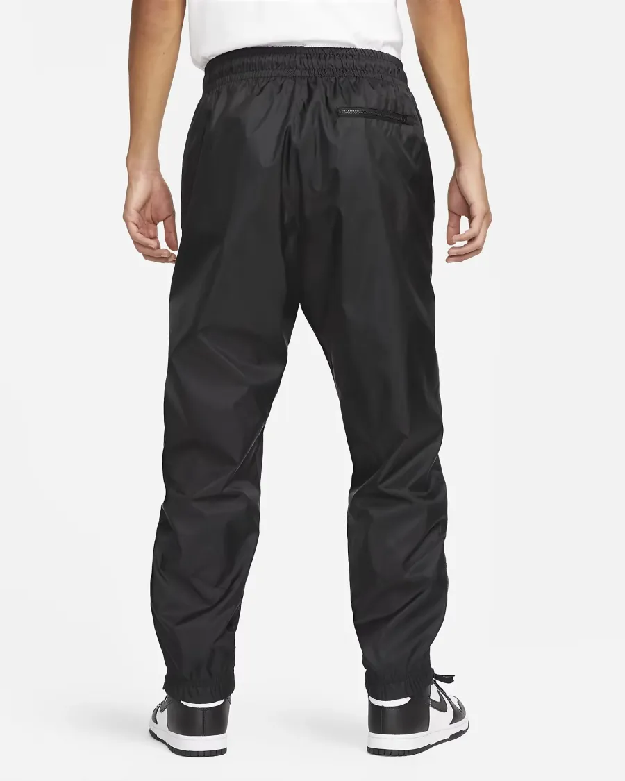 Штани Nike Windrunner Woven Lined Pants DX0653-011