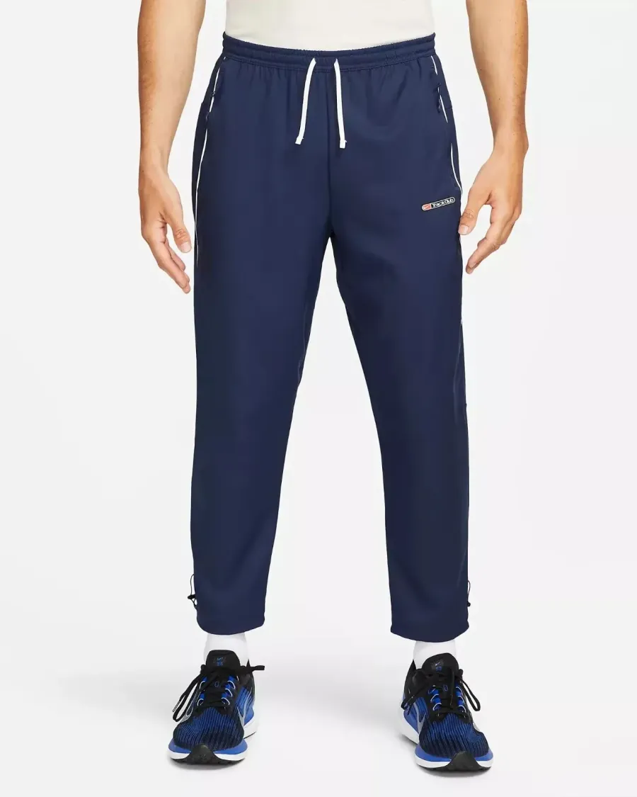 Спортивні штани Nike Challenger Track Club FB5503-410