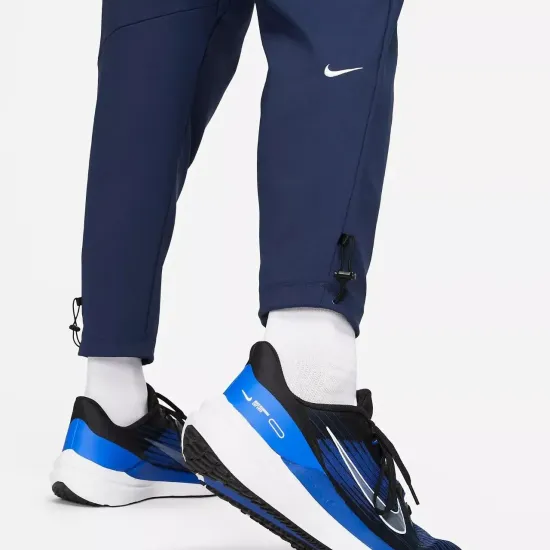 Спортивні штани Nike Challenger Track Club FB5503-410