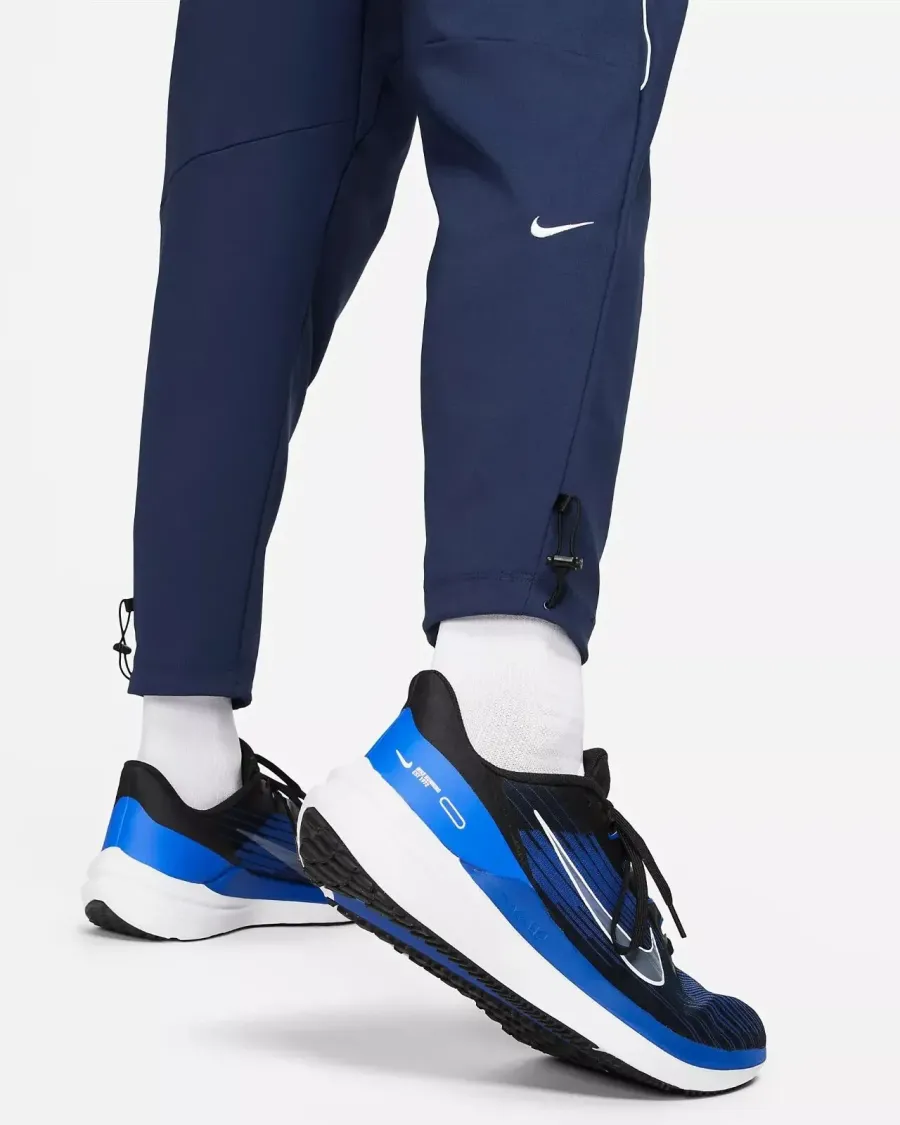 Спортивні штани Nike Challenger Track Club FB5503-410