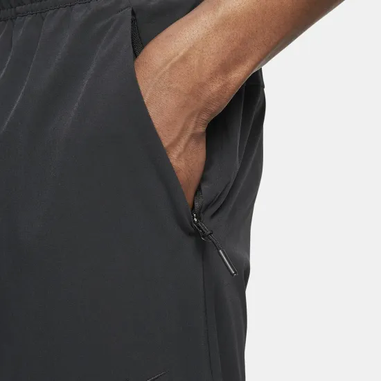 Спортивні штани Nike Dri-Fit Unlimited Tapered Leg FB7548-010