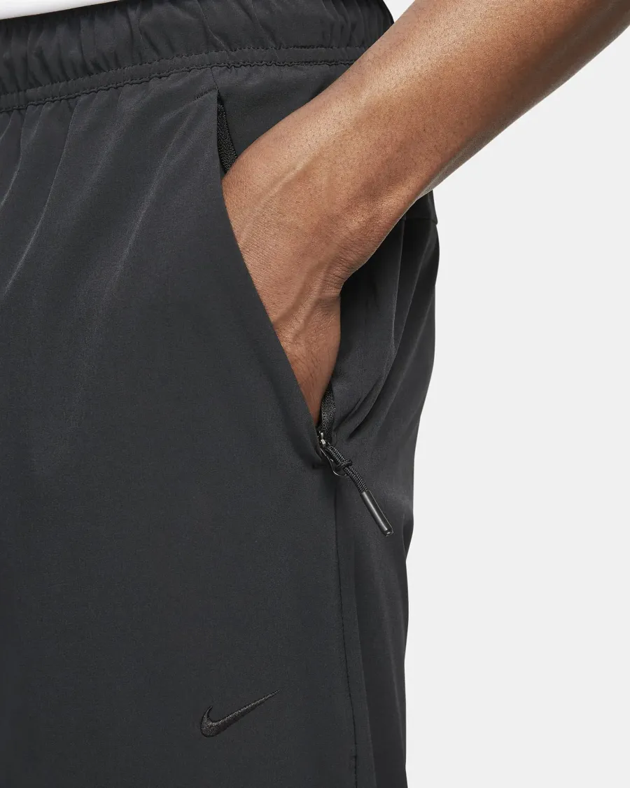 Спортивні штани Nike Dri-Fit Unlimited Tapered Leg FB7548-010