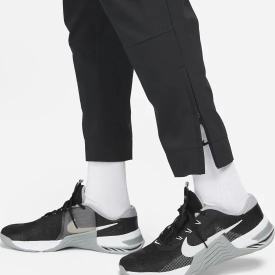 Спортивні штани Nike Dri-Fit Unlimited Tapered Leg FB7548-010