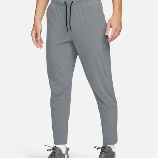 Спортивні штани Nike Dri-Fit Unlimited Tapered Leg FB7548-084