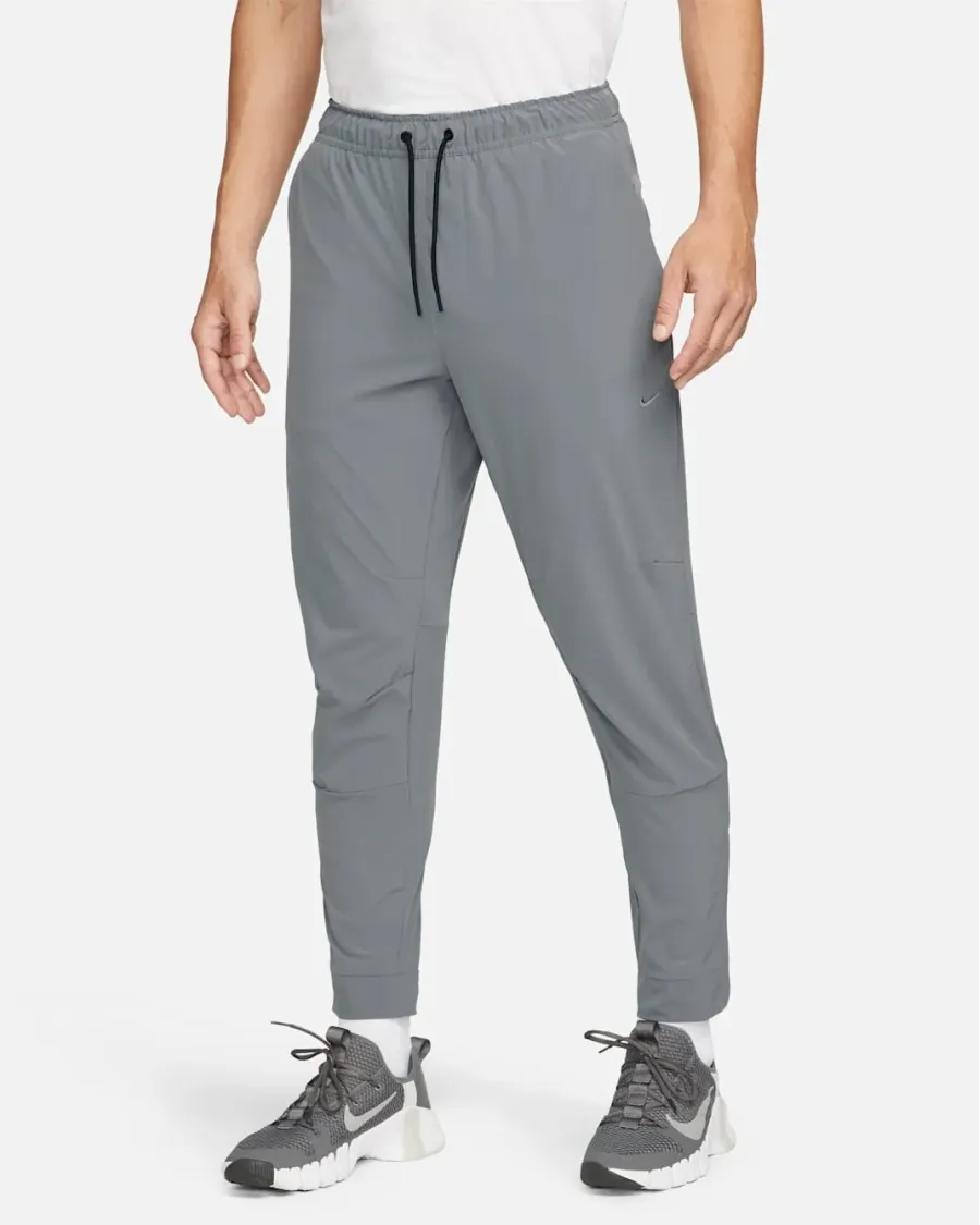 Спортивні штани Nike Dri-Fit Unlimited Tapered Leg FB7548-084