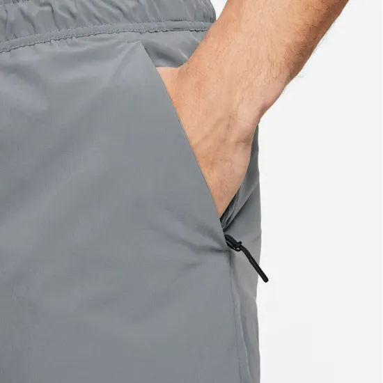 Спортивні штани Nike Dri-Fit Unlimited Tapered Leg FB7548-084