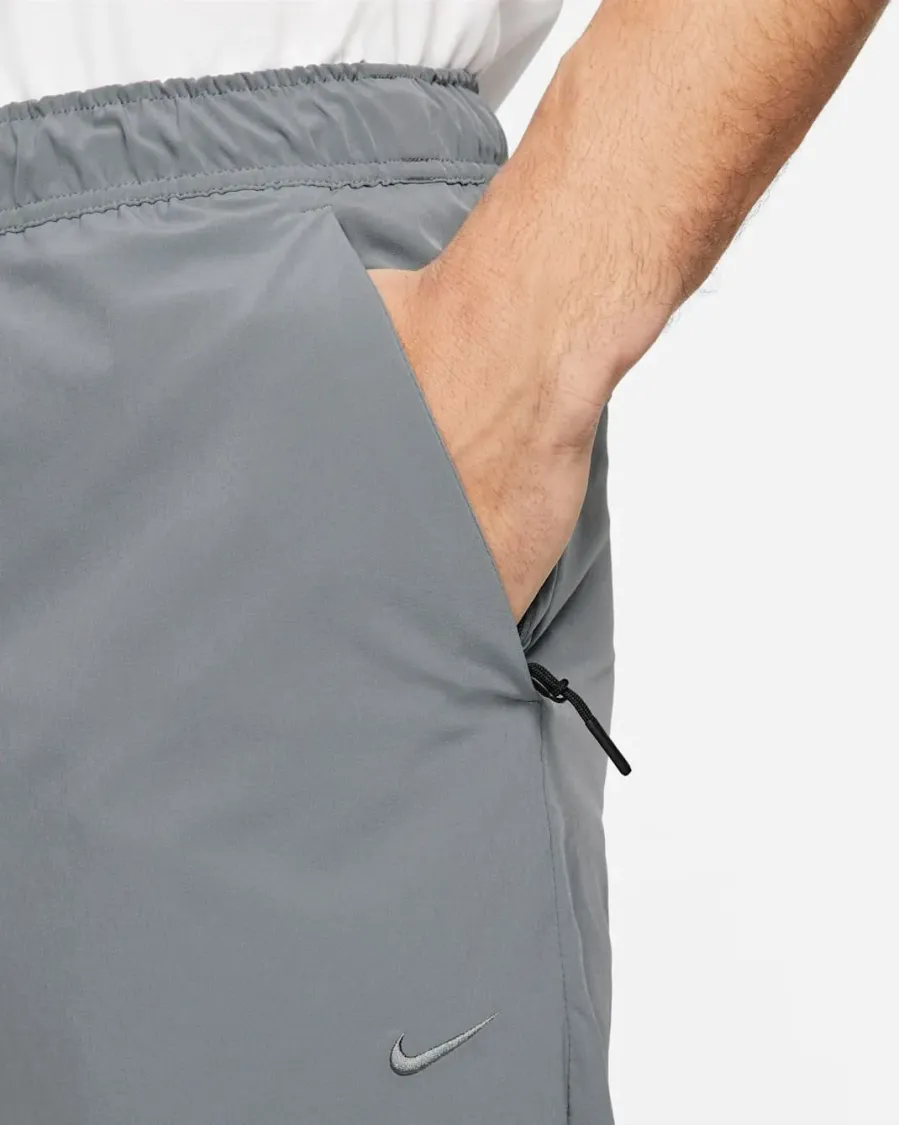 Спортивні штани Nike Dri-Fit Unlimited Tapered Leg FB7548-084