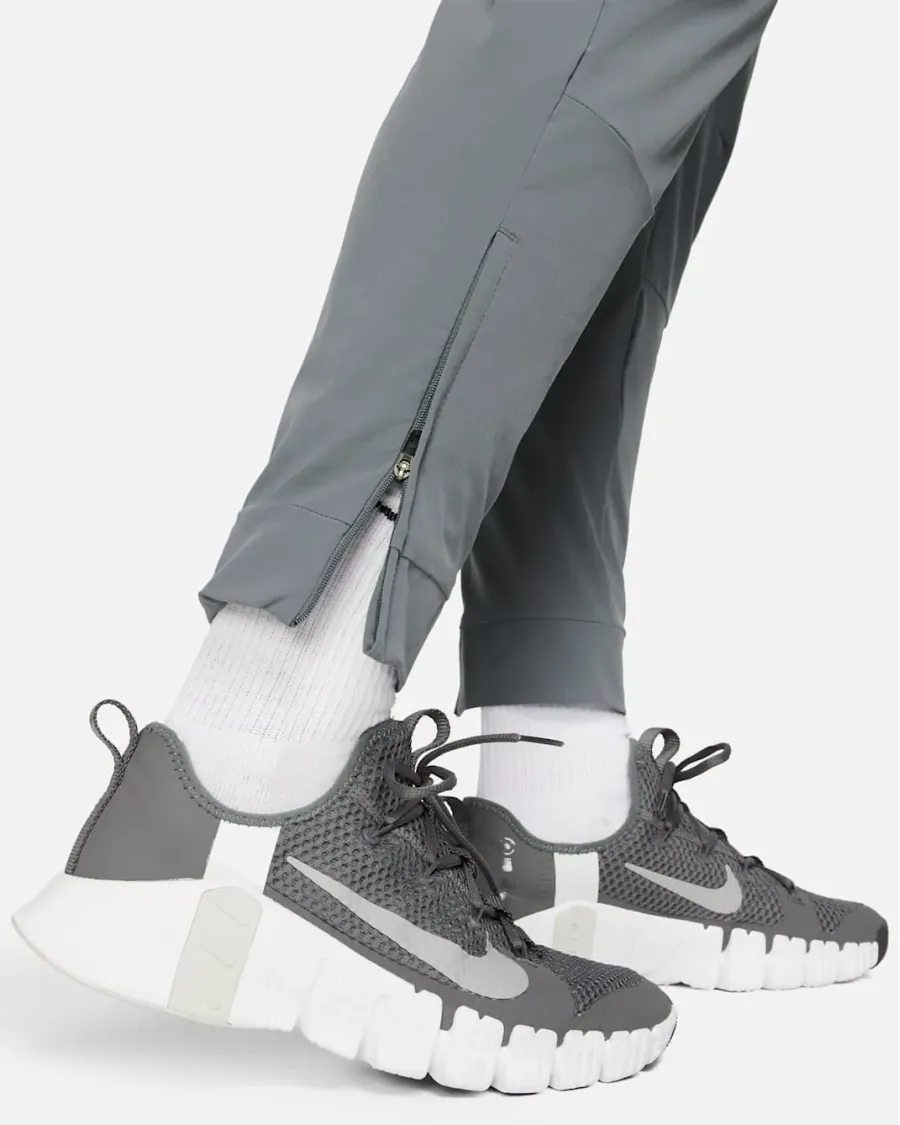 Спортивні штани Nike Dri-Fit Unlimited Tapered Leg FB7548-084