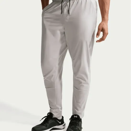 Спортивні штани Nike Dri-Fit Unlimited Tapered Leg FB7548-097