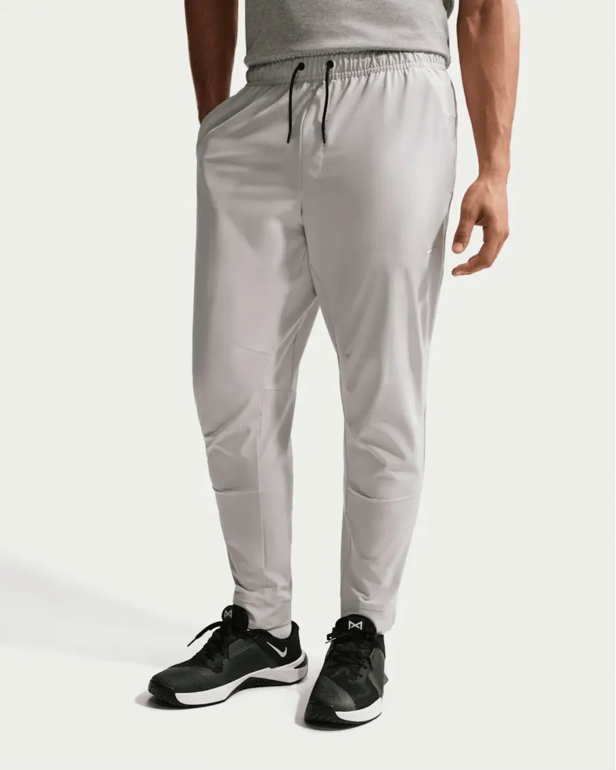 Спортивні штани Nike Dri-Fit Unlimited Tapered Leg FB7548-097