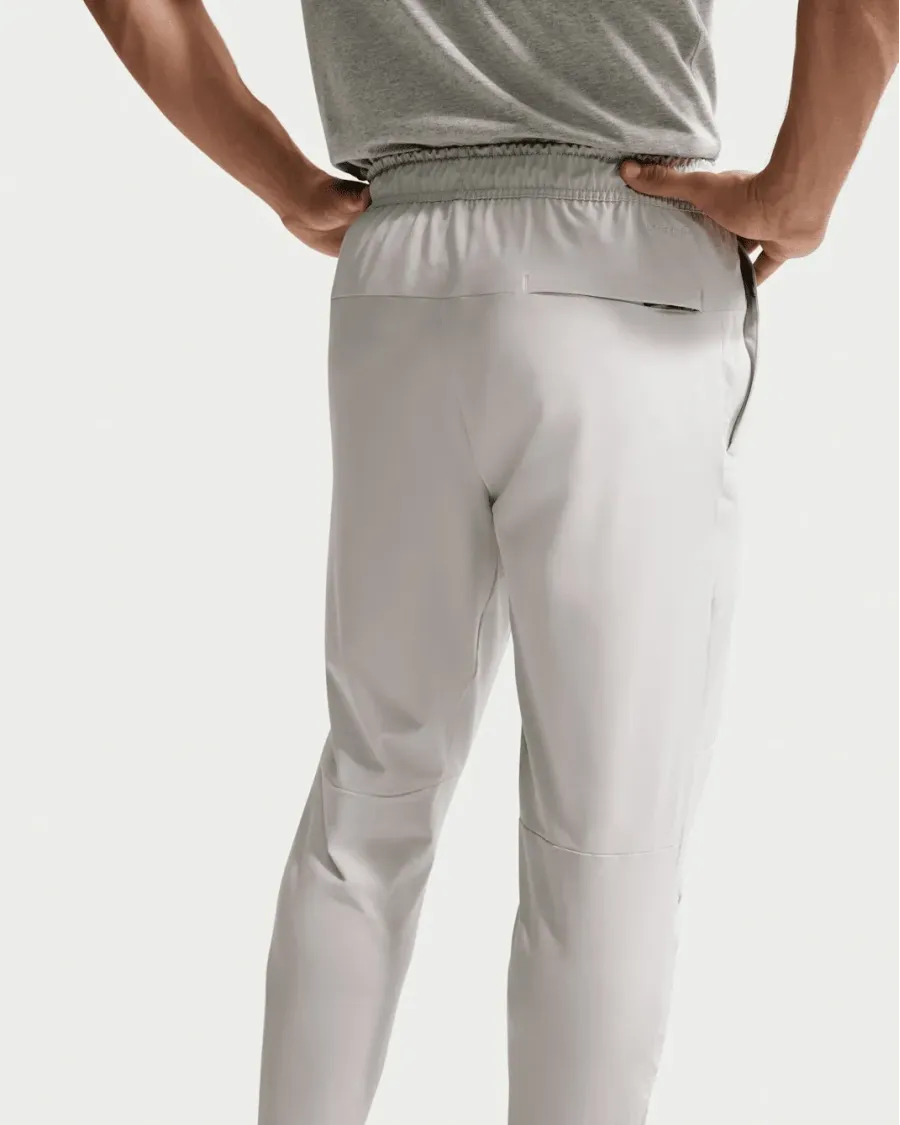 Спортивні штани Nike Dri-Fit Unlimited Tapered Leg FB7548-097