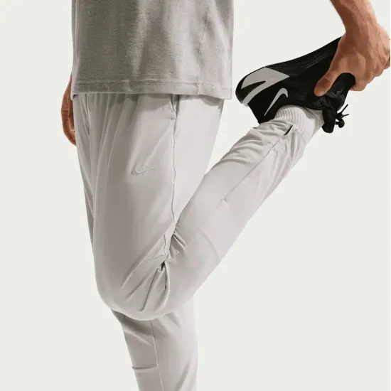 Спортивні штани Nike Dri-Fit Unlimited Tapered Leg FB7548-097