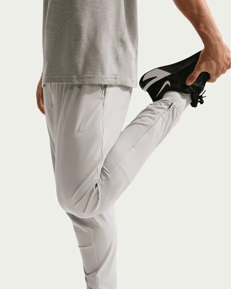 Спортивні штани Nike Dri-Fit Unlimited Tapered Leg FB7548-097