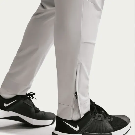 Спортивні штани Nike Dri-Fit Unlimited Tapered Leg FB7548-097