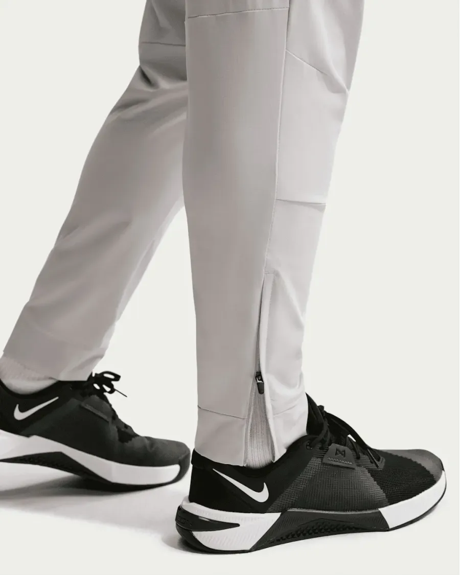 Спортивні штани Nike Dri-Fit Unlimited Tapered Leg FB7548-097