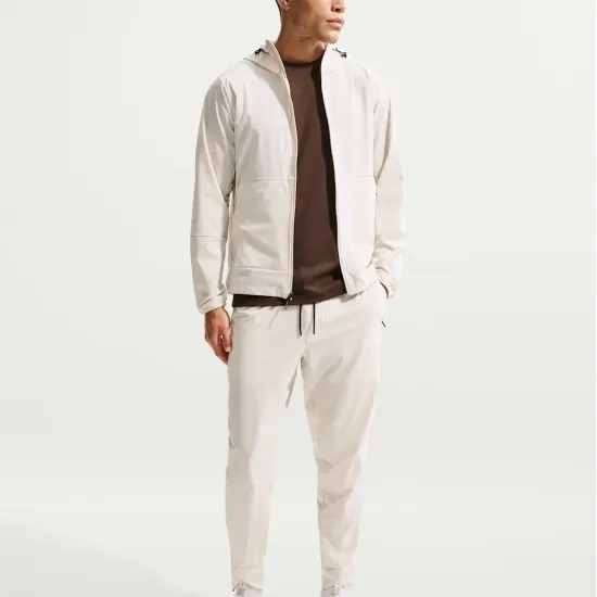 Спортивні штани Nike Dri-Fit Unlimited Tapered Leg FB7548-104