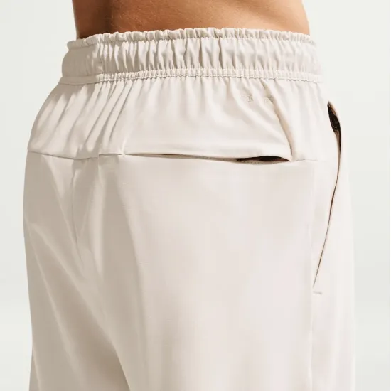 Спортивні штани Nike Dri-Fit Unlimited Tapered Leg FB7548-104