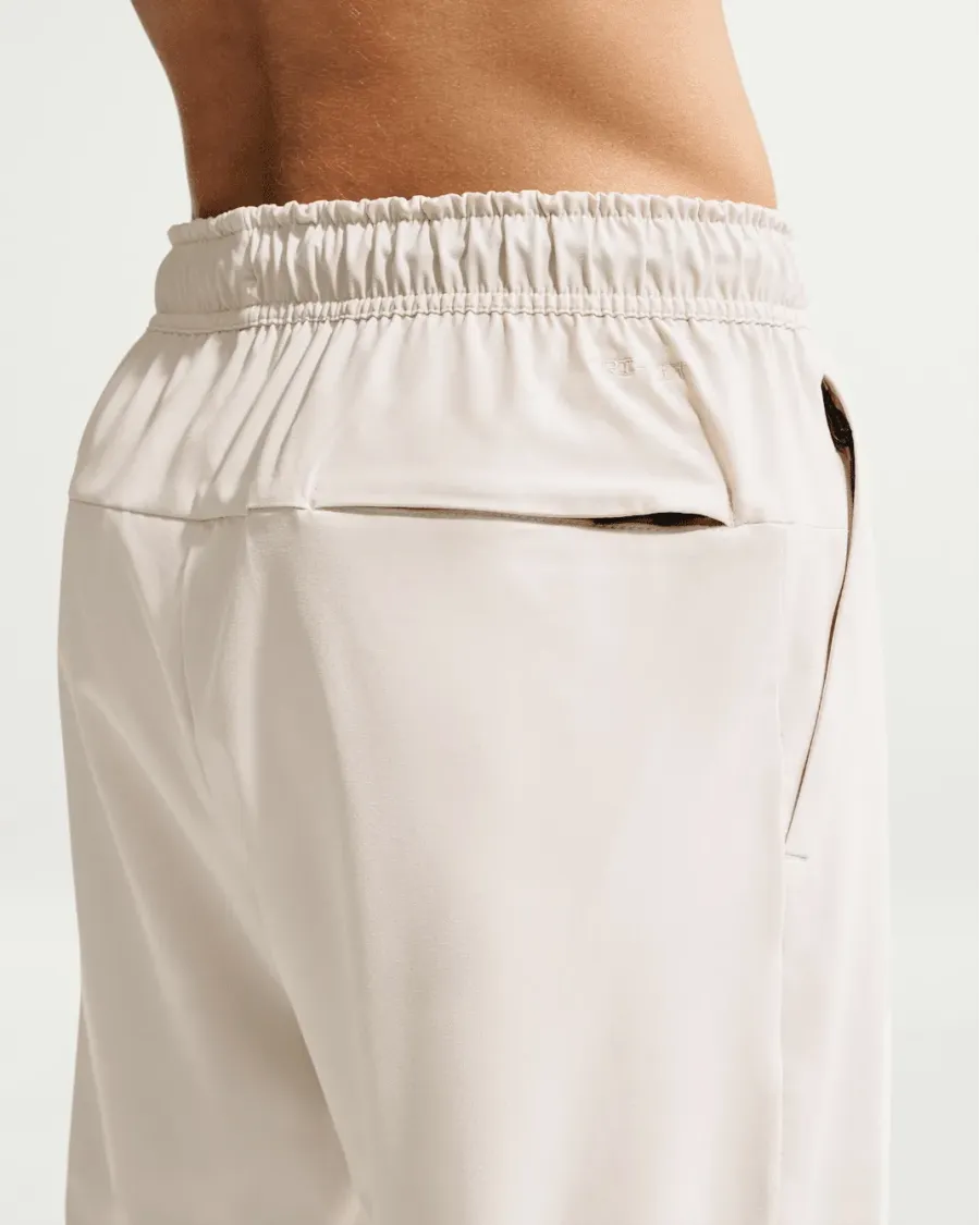 Спортивні штани Nike Dri-Fit Unlimited Tapered Leg FB7548-104