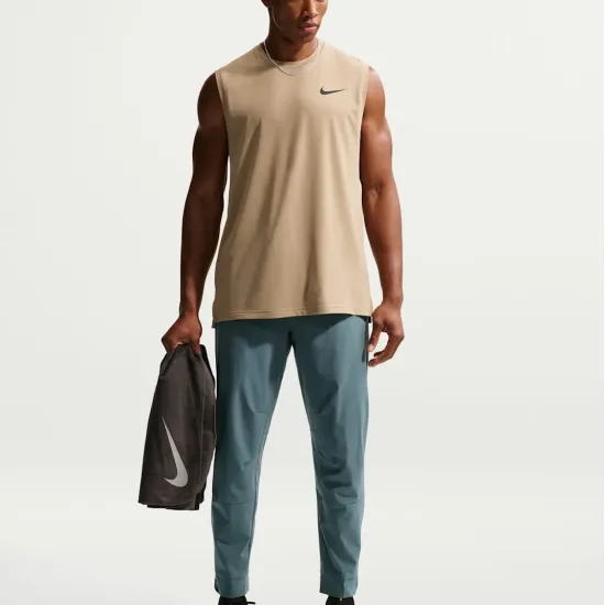 Спортивні штани Nike Dri-Fit Unlimited Tapered Leg FB7548-382