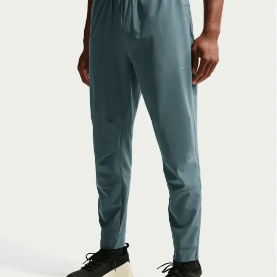 Спортивні штани Nike Dri-Fit Unlimited Tapered Leg FB7548-382