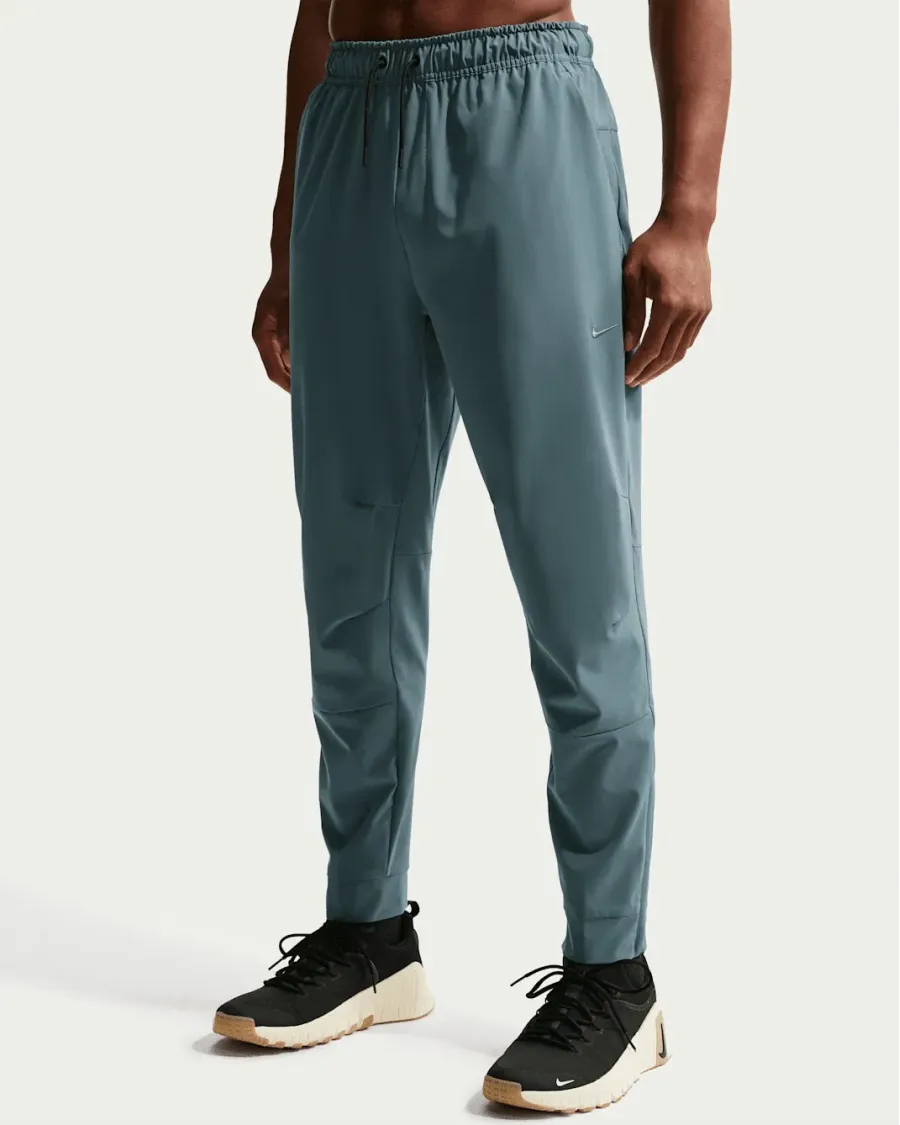 Спортивні штани Nike Dri-Fit Unlimited Tapered Leg FB7548-382