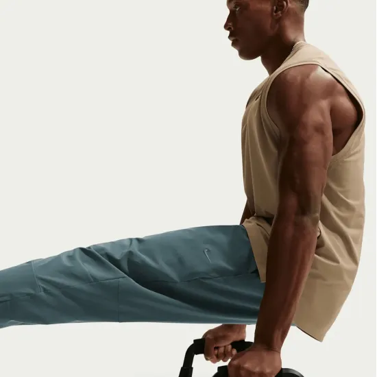 Спортивні штани Nike Dri-Fit Unlimited Tapered Leg FB7548-382