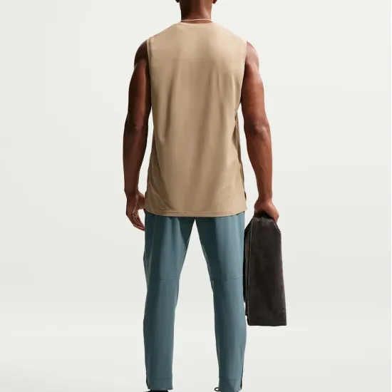 Спортивні штани Nike Dri-Fit Unlimited Tapered Leg FB7548-382