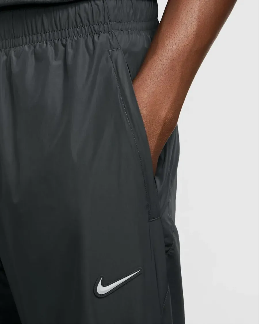Штани Nike NRG NOCTA Tech Woven FN7668-060
