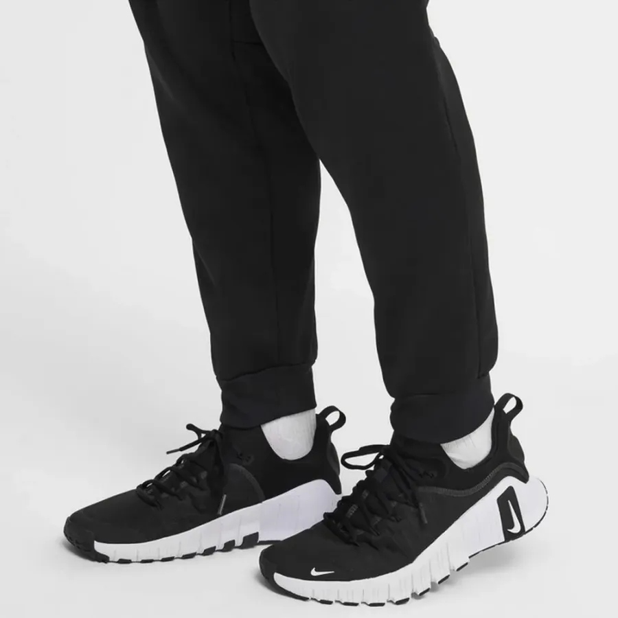 Штани Nike Therma‑FIT GFX Tapered FZ1062-010
