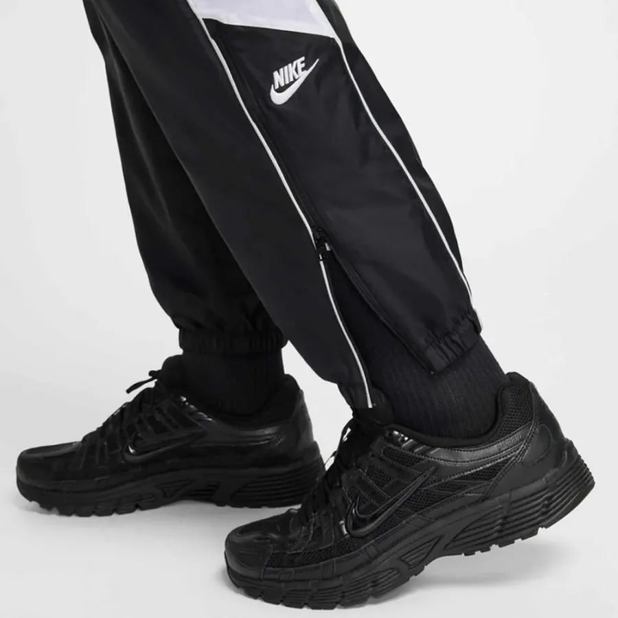 Штани Nike Club Woven Joggers HJ2244-010