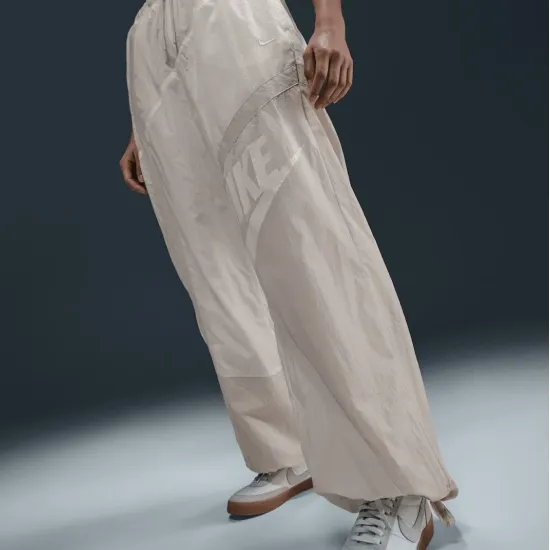 Штани Nike Sportswear Mid-Rise Loose Woven Open-Hem Trousers HJ4178-133