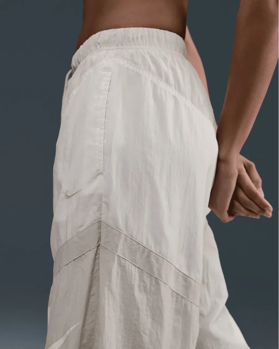 Штани Nike Sportswear Mid-Rise Loose Woven Open-Hem Trousers HJ4178-133