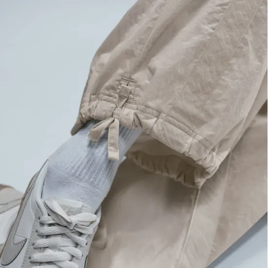 Штани Nike Sportswear Mid-Rise Loose Woven Open-Hem Trousers HJ4178-133