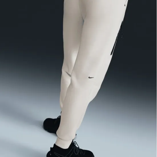 Штани Nike Sportswear Tech Fleece Mid-Rise HV6779-110