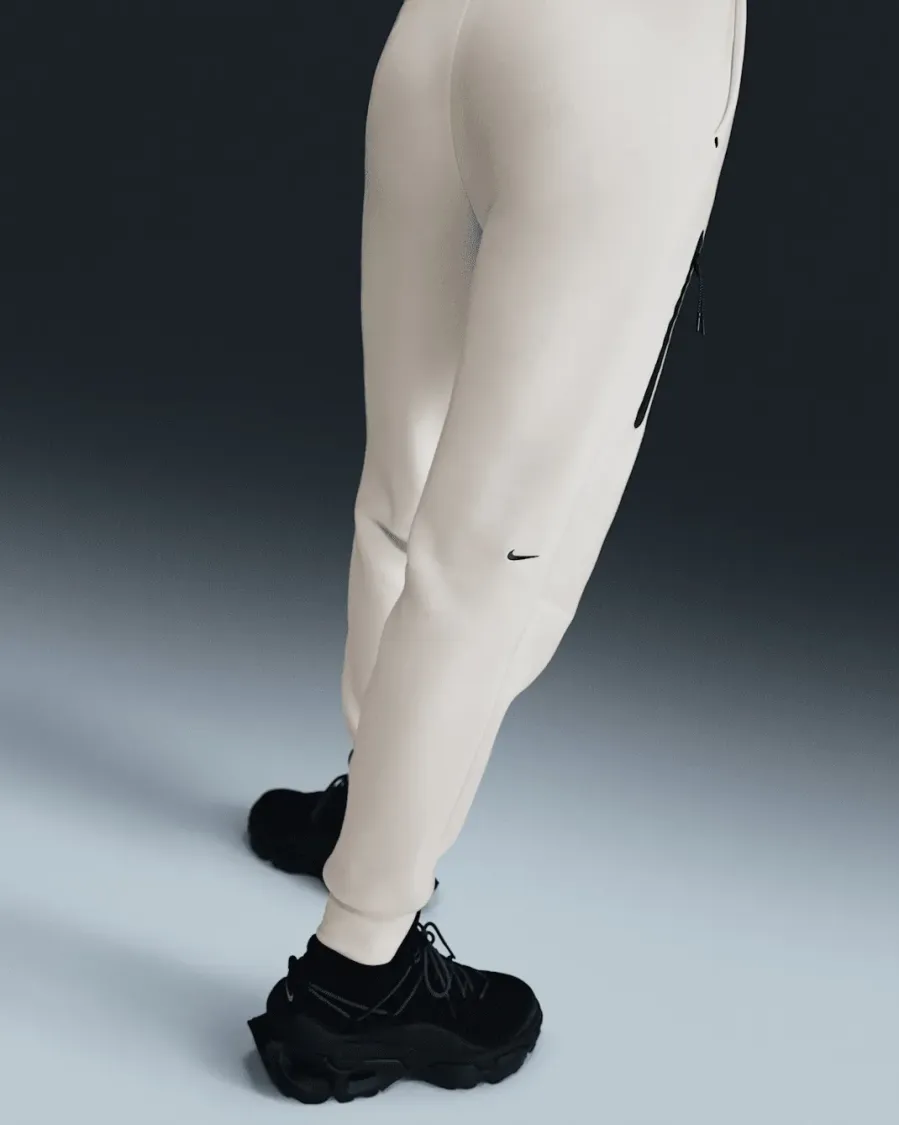 Штани Nike Sportswear Tech Fleece Mid-Rise HV6779-110