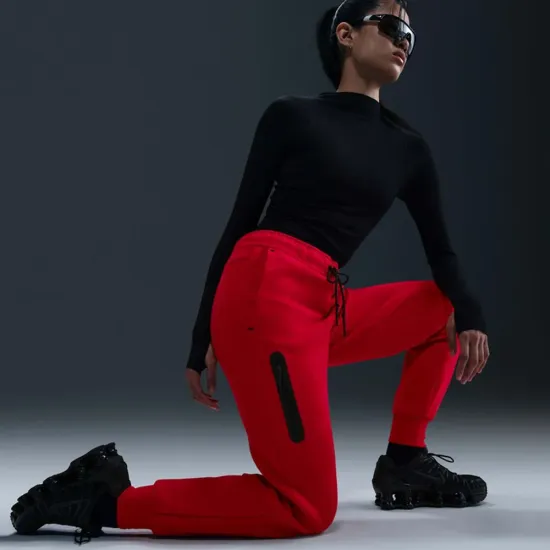 Штани Nike Sportswear Tech Fleece Mid-Rise HV6779-657